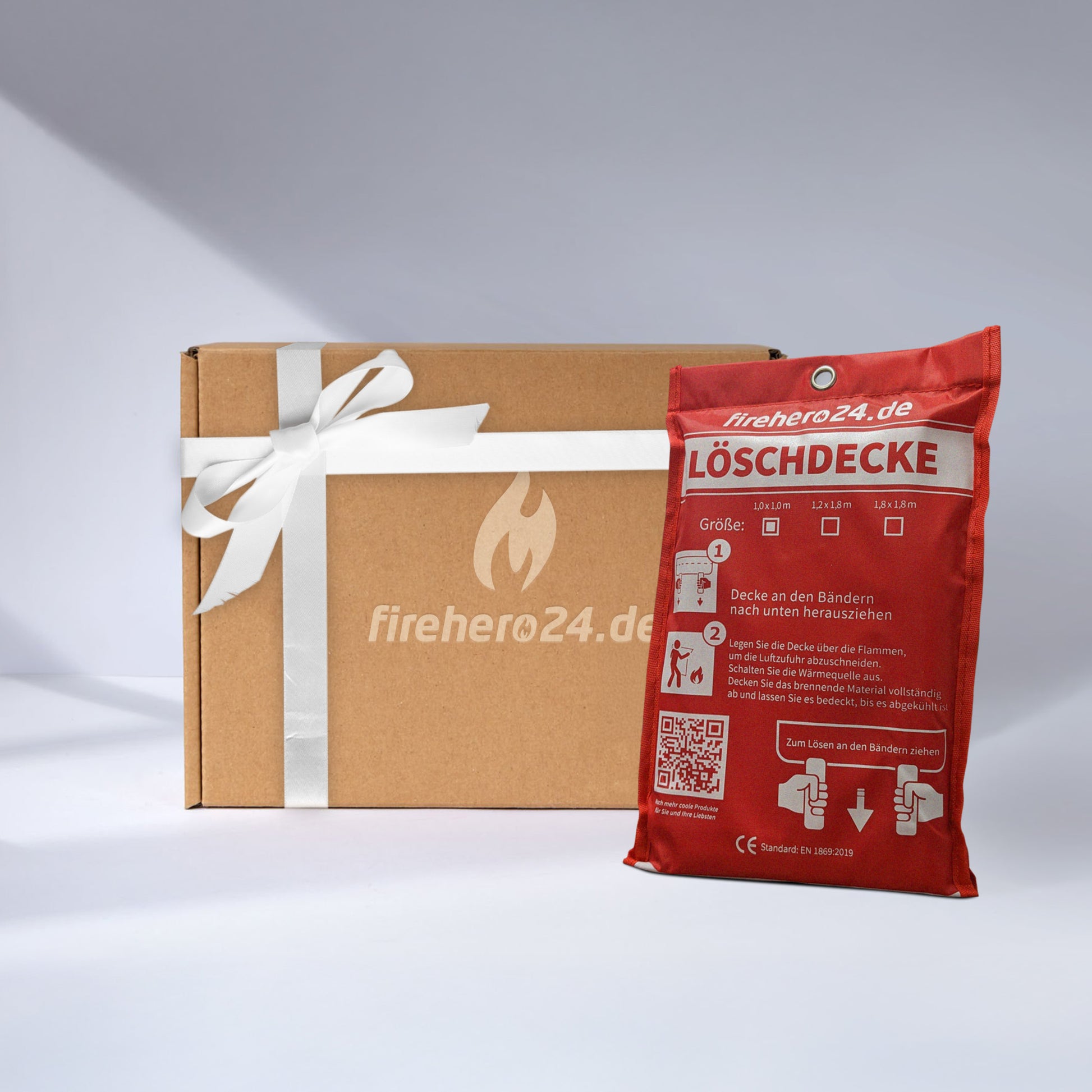 Geschenkidee Feuerlöschdecke mit rotem Geschenkkarton